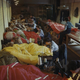 WAAF personnel on an RAF glider station in Britain repair and pack colored parachutes for use by airborne troops during the Normandy invasion. (Imperial War Museum)